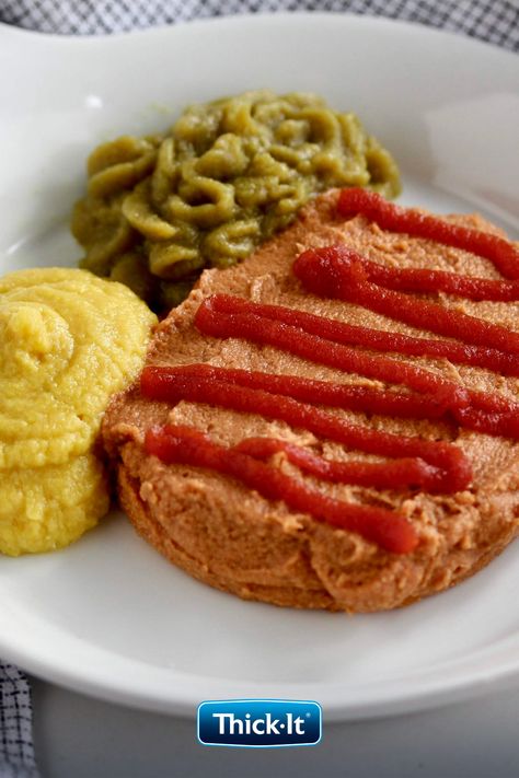 Puréed meatloaf with red ketchup, puréed green beans, and puréed sweet corn on a white dish with a checkered napkin background Pureed Recipes, Dysphagia Diet, Pureed Diet, Pureed Food, Seasoned Green Beans, Meatloaf Mix, Soft Foods Diet, Traditional Meatloaf, Classic Meatloaf Recipe