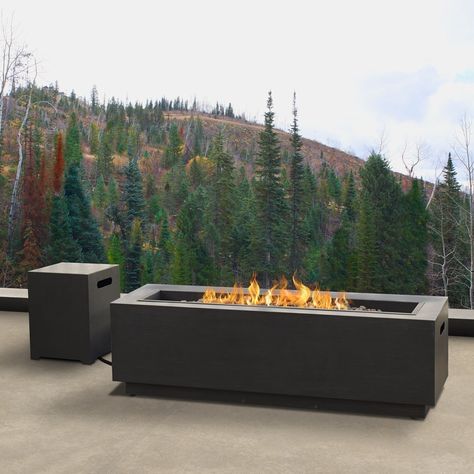 The Real Flame Lanesboro propane fire table keeps it simple. Its sleek straight lines make it the perfect choice for anyone looking to add modern style to their patio. Emitting 65,000 BTU's of heat, this fireplace is perfect for any cool summer night and crisp fall day! The Lanesboro's push button start makes lighting the flame safe and easy. Powder coated steel, 65,000 BTU burner, CSA Certified. Burns up to 6 hours (high setting) or up to 20 hours (low) (LP tank not included). Includes: Gray po Sanctuary Outdoor, Propane Fire Table, Outside Fire Pits, Fire Pit Materials, Natural Gas Fire Pit, Fire Pit Furniture, Propane Fire Pit Table, Gas Fire Table, Water Wall