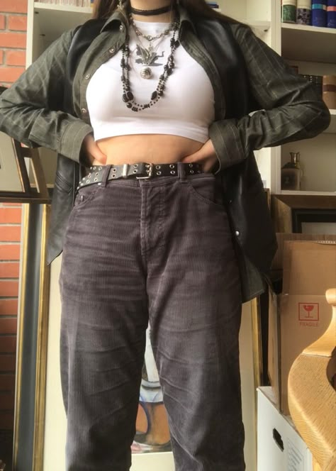 A mid-size person/girl wearing a wide black waistcoat, a thrifted dark olive green flannel under it, wide black corduroy pants, white Nike blazers and multiple crystal rings and bracelets. 	The person is also wearing multiple silver necklaces, one in form of a green crystal and another in form of a fairy  necklace, a black bead necklace, a butterfly and a black lace choker. Mid Size Flannel Outfit, Autumn Tones Fashion, Mid Sized Aesthetic, Ravencore Aesthetic Outfit, Forest Green Clothes Aesthetic, Mid Size Fairycore, Mid Size Fairy Grunge, Aesthetic Mid Size Outfits, Crystals Aesthetic Outfit