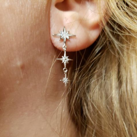 "Sterling Silver Star or Starburst Drop Earrings 3 Stars dangle, each graduating in size, articulated, and featuring small Cubic Zirconia stones on every star. 1\" long, top star is 3/8\" across. All Sterling Silver, which is then layered with a derivative of Platinum called Rhodium to keep them shiny and tarnish-free. Hallmarked 925 AHM *Brand New* Contact me with any questions" Drop Star Earrings, Silver Prom Earrings, Dangly Star Earrings, Dainty Star Silver Earrings, Silver Star Earrings Dangle, Silver Star Crystal Earrings, Dangly Star Earrings Silver, Homemade Pendant, Star Earrings Dangle