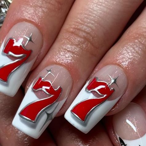 Nawel 🌸 Nail artist 🧸 paris on Instagram: "LUCKY YOU 🧲 @chloe.riviera  . Repro @nailsbycookiee  . . Using red @elya.maje  @sissiofficial_ @thepainteddesert  #nails#Nailart#nailsinspo#gelx#gelxnails#nailartparis#nailsparis#pressonnails#naturalnails#nailsofinstagram#naildesign#nailsonfleek#nailstagram#nails2inspire#nailsnailsnails#royalty#royaltynails#nailsoftheday#lewanails#gelnails#pressonnails#nailslover" Hot Rod Nails, Lucky 7 Nails, Casino Nails Designs 777, Jackpot Nails, Short Square Red Nail Designs, Lottery Nails, 1998 Nails, Number Nail Design, Different Nails On Each Hand