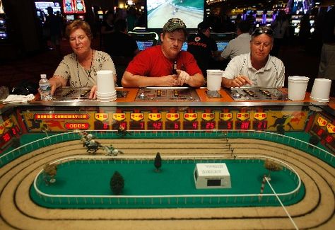 Low-tech horse race game has loyal following | Life Derby Games, Horse Racing Track, Horse Race Game, Quiet Person, Vegas Theme, Racing Track, Race Tracks, Caesars Palace, Churchill Downs