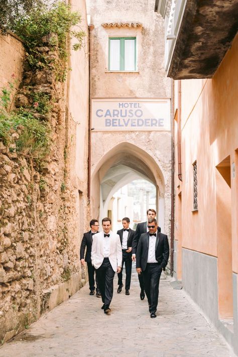 Groom And Groomsmen Photos From A Destination Wedding In Italy | Destination Wedding Photographers | Indulge in the enchantment of Halley and Matt's modern Italian wedding in the picturesque Amalfi Coast. Get inspired by unique wedding ideas, Groomsmen attire, timeless wedding photos and discover the perfect destination wedding locations in Italy. Transform your love story into breathtaking pictures - Book your Italy wedding Photographers at giannidinatale.com Italian Wedding Groomsmen, Wedding Ideas Groomsmen, Modern Italian Wedding, Groom And Groomsmen Photos, San Gimignano Italy, Italy Destination Wedding, Timeless Wedding Photos, Sicily Wedding, Groomsmen Looks