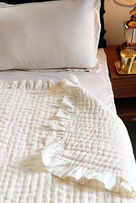 This luxe ivory linen custom quilt reverses to soft ivory cotton fabric. The premium linen comforter is precisely hand quilted in channel pattern giving each quilt a unique texture and tonal look. Reverses to plain fabric at the back. Each quilt is pre-washed for a natural and soft look. This cozy linen quilt can be used as a bedspread, coverlet or blanket all year long.  -------------------------------------------------------------------------- These quilts can be custom made for you. Ask about size, fabric color and monogramming  -------------------------------------------------------------------------- ► Matching shams are available ► Want to see the fabric? Ask for a swatch --------------------------------------------------------------------------  ABOUT THE LINEN The linen is made fro Linen Coverlet, Blanket Linen, Linen Bed Cover, Linen Comforter, King Bedding, Twin Bedspreads, Queen Bedspread, Quilted Blanket, Linen Bed