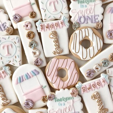 BasicWhiteBatchCookieCo on Instagram: "Donut grow up. A theme too sweet for words . . #donutgrowup #toosweet #donutcookies #donutbirthday #donuts #donut #decoratedcookies #royalicingcookies #royalicingart #customcookies #birthdaygirl #sprinkles #sugarcookiesofinstagram" Sweet One Donut Cookies, Sweet One Sugar Cookies, Sweet One Birthday Cookies, Donut Cookies Decorated, Sweet One Cookies, Specialty Cookies, Donut Cookies, First Birthday Cookies, Birthday Donuts