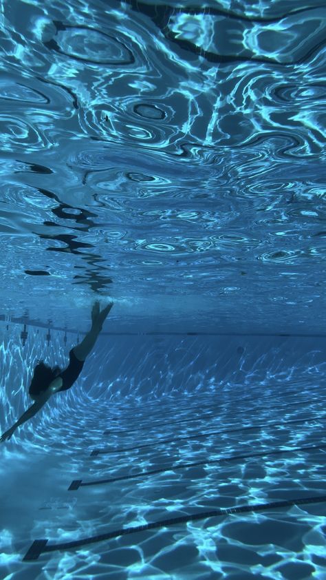 Dive into a tranquil underwater world with this mesmerizing shot of a lone swimmer surrounded by the gentle dance of light on water. Perfect for those who appreciate the beauty of aquatic life and serene moments beneath the surface. Underwater photography, ocean, tranquil, serenity, aquatic life, light reflections, swimming, pool #UnderwaterPhotography # photography #water #underwater #photo #aesthetic #photoshoot #inspo #ideas #Ocean #Beauty #Serenity #Tranquil #Swimming #Art Diving Photoshoot, Aesthetic Underwater Photos, Swimmer Aesthetic, Teal Underwater Aesthetic, Light On Water, What Is My Aesthetic, Swimming Aesthetic, People Swimming Underwater, Swimming Art