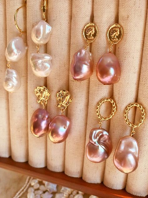 🎉🍾 Just look at these amazing AKOYA pearl beads!! Preparing for a busy weekend of craft shows by creating eye-catching baroque pearl neckpieces. Each bead strung is a note in the symphony of design. 🎶👗 #FestiveCreations #pearlartist #ArtisanJewelry #PearlNecklace #pearlearing #earringlove #earringslover #handmadeearings #handmadejewelry #earringstagram #earringshandmade #earringsoftheday #earringaddict #HandmadeJewelry #PearlCraft #pearls #baroquepearl #baroqueearring #handmadewithlove #pea... Filipino Pearl Jewelry, Pearl Jewelry Vintage, Pearl Jewellry, Pearl Earrings Designs, Pearl Crafts, Holiday Wishlist, Art Fairs, Pearl Jewelry Design, Buy Pearls