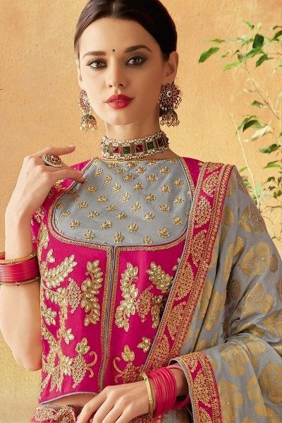 Step into the world of elegance with this Light Grey Pink Brocade Silk Embroidered Lehenga Set. The intricate embroidery on the silk fabric exudes charm and sophistication. Perfect for special occasions.
PRICE:  $110.00 Lehenga With Long Choli, Rajasthani Lehenga, Long Choli Lehenga, Choli Blouse Design, Brocade Lehenga, Pink Brocade, Ikat Blouse, Long Blouse Designs, Rajasthani Dress