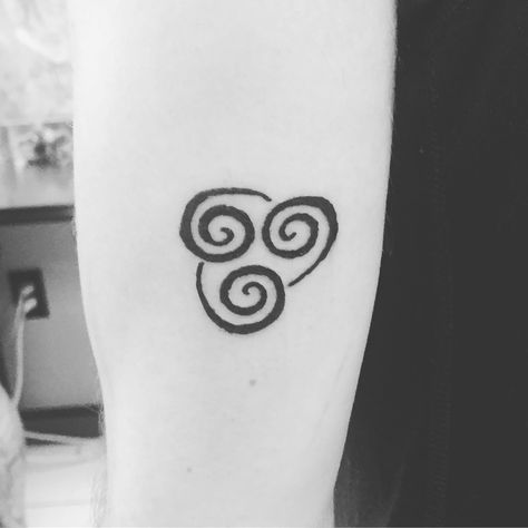 Avatar universe tattoo. The air nomad symbol looks great flying solo. :) Avatar Air Symbol Tattoo, Air Nomad Tattoo, Symbol Wrist Tattoo, Air Symbol Tattoo, Nomad Tattoo, Tattoo 2022, Air Symbol, Avatar Tattoo, Air Tattoo