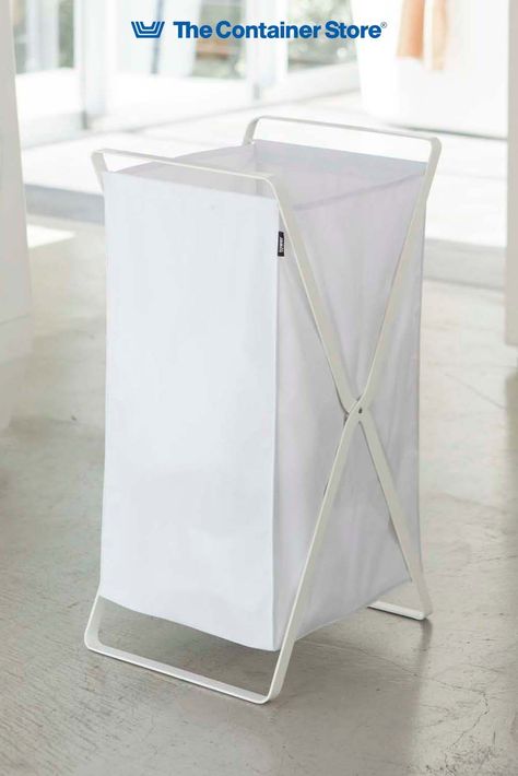 A lighter take on standard clothes baskets, this laundry hamper is as easy to carry as it is to fill. The secret: an open lightweight cotton design with foldable metal frame. You'll appreciate how portable it is with everything trip to the laundry room. A slim, minimalist profile makes this hamper perfect for dorms, closets and other small spaces. Wire Laundry Basket, Japanese Organization, Bathroom Cart, Laundry Hamper Storage, Laundry Tips And Tricks, Laundry Hampers, Folding Laundry, Style Hacks, Hamper Storage