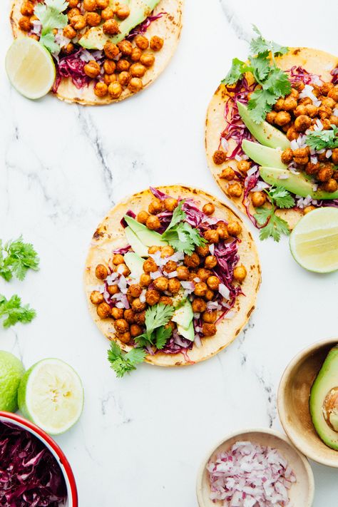 Roasted Chickpea Tacos With Avocado | kellyneil.com - These roasted chickpea tacos are a quick, easy, and affordable way to provide your family with the protein they need. Although as a family we do eat meat, we’ve been cooking (and often preferring!) plant-based recipes for meals on a weekly basis. We recently discovered roasted chickpeas for snacking and now we can’t get enough! We change up the spice blend depending on what’s in the pantry, and though roasted chickpeas are great for eating by Roasted Chickpea, Chickpea Tacos, Chickpea Burger, Spiced Chickpeas, Chickpea Soup, Chickpea Pasta, Yogurt Dressing, Crispy Chickpeas, Blogger Photos