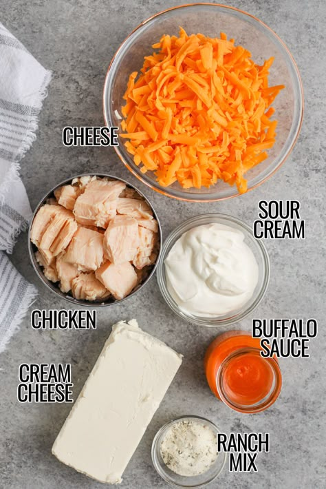 Homemade buffalo chicken dip is quick and easy to make! It is a rich and creamy dip made with ingredients like cream cheese, sour cream, and buffalo sauce for an extra kick! #spendwithpennies #buffalochickendip #appetizer #snack Dutch Oven Buffalo Chicken Dip, Buggalo Chicken Dip Oven, Easy Buffalo Chicken Dip Rotisserie, Buffalo Chicken Dip Cast Iron Skillet, Layered Buffalo Chicken Dip Oven, Buffalo Chicken Dip No Crock Pot, Franks Buffalo Chicken Dip Oven, Buffalo Chicken Dip Ideas, Buffalo Chicken Dip With Ranch Seasoning