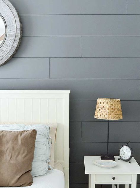 When you think of shiplap, you might just picture white, but pairing it with a bold, dramatic shade adds a touch of modern to rooms like this bedroom. #shiplap #diyshiplap #shiplapideas #coastalshiplap #bhg Wainscoting Ideas, Black Stairs, Shiplap Wall Diy, Shiplap Wall, Diy Shiplap, Diy Wand, Plank Walls, Wallpaper Accent Wall, Wall Table