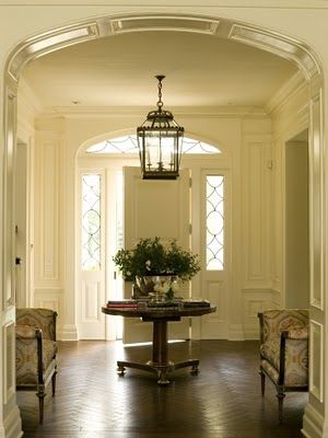 #windows, #herringbone floors, wall #molding, #arch detail, center table Harrison Design, Hall Lighting, Casas Coloniales, Foyer Decorating, Foyer Design, Entrance Foyer, Entry Hallway, Entry Hall, Entry Way