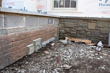 Stone Veneer Over Brick - all of your sills (below the windows) will need to be a deeper 6+ inch depth. All of the places where brick terminates at the side of windows will still need to be cut back 2" and you will need to purcase more corners (more expensive). Diy Stone Veneer, Brick Veneer Siding, Stone Veneer Exterior, Stone Veneer Fireplace, Faux Stone Veneer, Stone Veneer Siding, Faux Stone Siding, Stone Veneer Panels, Stacked Stone Fireplaces