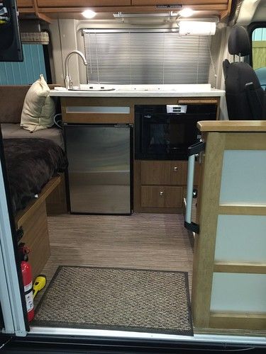 Travato 59k Hacks, Class B Rv Storage Ideas, Travato 59k, Best Small Rv, Rv Storage Organization, Winnebago Travato, Microwave Hacks, Travel Trailer Living, Class B Motorhomes