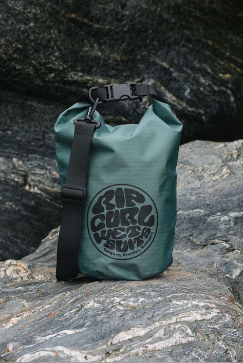 The Surf Series 5L Barrel Bag is more than a bag; it's technical wet and dry equipment for the beach. All Natural Sunscreen, Surfing Accessories, Surf Bag, Wardrobe Revamp, Lily Ring, Coastal Jewelry, Surf Jewelry, Wet Dry Bag, Surf Brands