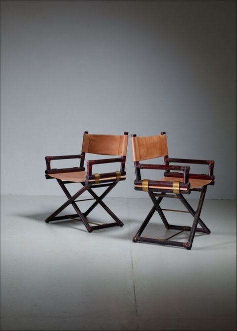 A pair of director's chairs made of stained ash and a sling leather seating and backrest. The connections are made of brass and leather cord. This model was designed in 1956 for the McGuire Furniture company. Mcguire Furniture, Director Chair, Director's Chair, Leather And Brass, Directors Chair, Furniture Companies, Leather Seat, Leather Cord, Outdoor Chairs