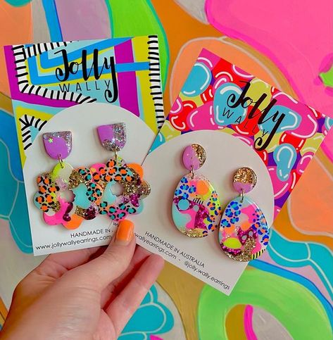 Jolly Wally on Instagram: "🌈🌈 Meet Macy! (On the left) and her friend …. Unknown name yet (please provide suggestions😁) both available next Thursday night in restock!! 7pm! . . . . . . . . . . #whatheteacherwore #supporthandmadegoods #resinearrings #earrings #resin #glitterearrings #madeinaustralia #teacherearrings #girlssupportgirls #earringaddict #earringaddiction #jollywally #statementstuds #statementdangles #glitter #statementearrings #earringsoftheday #colour #neoncolour #colourfulaccess Resin Glitter Earrings, Resin Earrings Ideas, Resin Earrings Diy, Diy Resin Earrings, Colourful Earrings, Diy Resin Projects, Tote Bags Sewing, Earrings Resin, Resin Projects