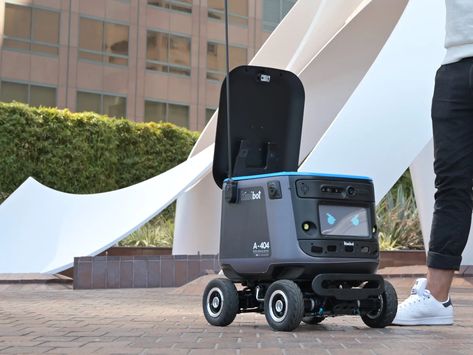 Chick-Fil-a Tests Robot Delivery Kiwibot in California: Photos Delivery Robot, Autonomous Robots, Chicken Sandwiches, California Photos, Santa Monica California, Adidas Girl, Futuristic City, A Robot, Robot Design