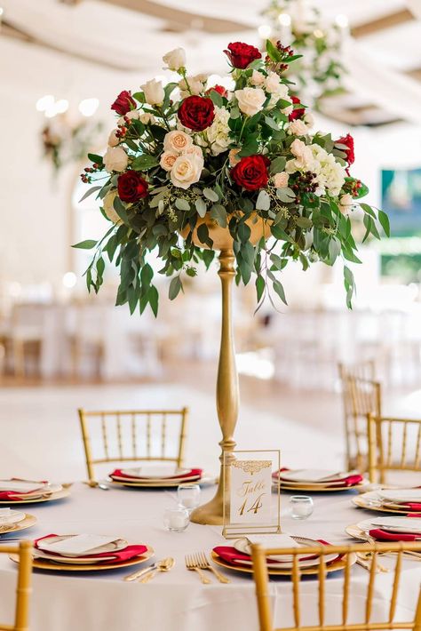 Wedding Decor With Red Roses, Red Rose Wedding Centerpieces, Red And Gold Wedding Reception, Red And White Centerpieces, Red Roses Wedding Decor, Red Wedding Theme Romantic, Red Flower Centerpieces, Round Table Centerpieces Wedding Simple, Red And Gold Wedding Theme