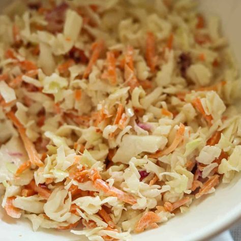 This Coleslaw for Pulled Pork is an absolute must have side dish for pulled pork bbq plates or load it onto pork sandwiches! This recipe uses only a few ingredients and bagged coleslaw mix to cut down the time. Homemade Coleslaw For Pulled Pork, Coleslaw Recipe For Pulled Pork No Mayo, Best Coleslaw For Pulled Pork, Pulled Pork Sandwiches With Coleslaw, Cole Slaw For Bbq Pork Sandwich, Pulled Pork Coleslaw Sandwich, Pulled Pork Egg Rolls, The Best Coleslaw, Coleslaw For Pulled Pork