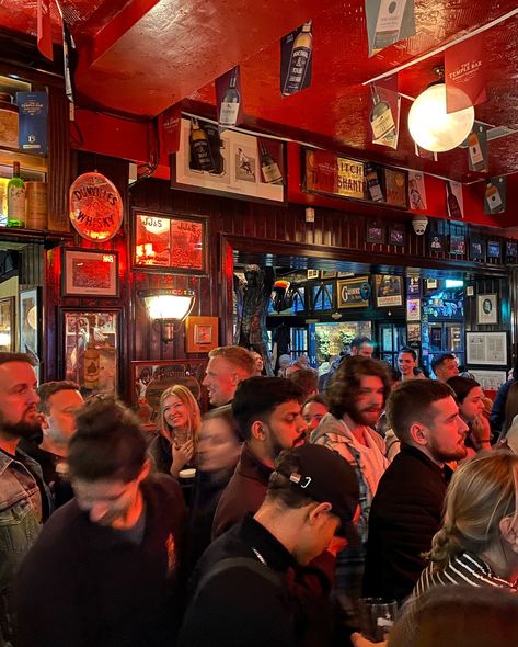 Temple Bar • A must-visit institution when visiting Dublin! The Temple Bar is located in Temple Bar (yes, it is confusing like that!) has been a long running pub that’s been awarded every year since 2002 as the Traditional Irish Music Pub of the Year. They play live music every day with rotating musicians and there’s no cover charge either so you can walk-in, grab a pint or just vibe with the music! It was such an experience, it felt like I was at a concert mosh pit and surprisingly lots of l... Christmas Pub, Irish Pub Aesthetic, Dublin Pub, Dublin Pubs, Irish Bar, Queen Of The South, Visit Dublin, Temple Bar, Old Irish