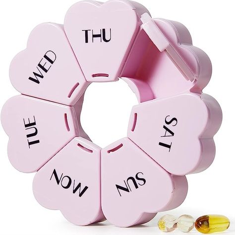 This large-capacity floral pillcase ensures organized storage for a week's worth of pills, accommodating up to 6 fish oils or 8 vitamins per slot. With a transparent lid, it's easy to identify pills without opening. Made of BPA-free, food-grade PP plastic, it's safe for use. Its colorful, compact design is travel-friendly, ensuring pills remain secure. Its user-friendly design opens easily, even for those with arthritis, and all compartments can be filled simultaneously. Cute Pill Box, Pill Pack, Fish Oil Vitamins, Medicine Dispenser, Melatonin Gummies, Pill Box Organizer, Weekly Pill Organizer, Medication Organization, Pill Dispenser