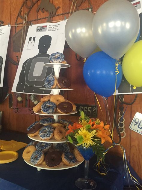 Police retirement donut display Cop Donut Bar, Cake Police, Police Officer Party, Police Themed Birthday Party, Academy Graduation Party, Officer Party, Donut Table, Police Retirement Party, Donut Display