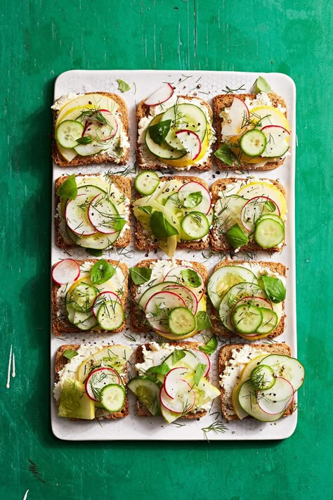 The cucumber sandwich is a tea party staple because it's light yet fancy. In this version, radishes spice up cucumbers on a bed of creamy herbed cheese. Cucumber Tea, Cucumber Tea Sandwiches, Best Party Appetizers, No Cook Appetizers, Cold Sandwiches, No Cook, Cheap Healthy, Cucumber Sandwiches, Cheap Healthy Meals