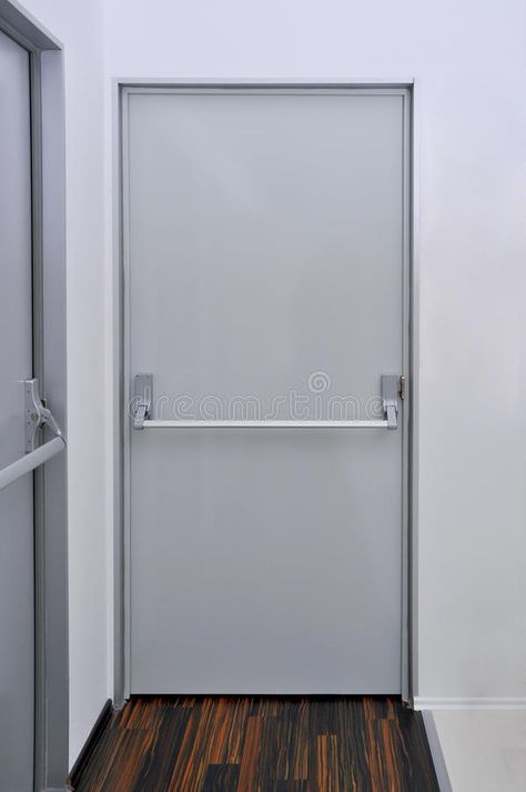 Emergency exit door. The details of the emergency exit door handle #Sponsored , #Affiliate, #Paid, #exit, #handle, #emergency, #Emergency Emergency Door Design, Emergency Exit Door, Rooftop Scene, Hang Pictures, Metal Grid, Hanging Display, White Doors, Hanging Pictures, Design Patterns