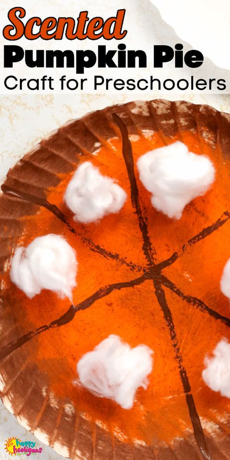 This Scented Pumpkin Pie Craft is painted on a paper plate "crust" and topped with dollops of cotton ball or pom pom "whipped cream". It's the perfect fun and easy Thanksgiving craft for toddlers and preschoolers. #HappyHoolgians #Thanksgiving #Craft #Pumpkin #Pie #Toddlers #Preschoolers #Daycare #Crafts #Sensory #Art #Activity #Fall #CottonBalls #Pompoms Cherry Pie Craft Preschool, Paper Plate Pumpkins Preschool, Pumpkin Pie Art Preschool, Pumpkin Pie Crafts Preschool, Pie Craft Preschool, Pumpkin Pie Crafts For Toddlers, Pumpkin Pie Craft Toddler, Pie Crafts For Preschool, Pumpkin Pie Craft For Preschool