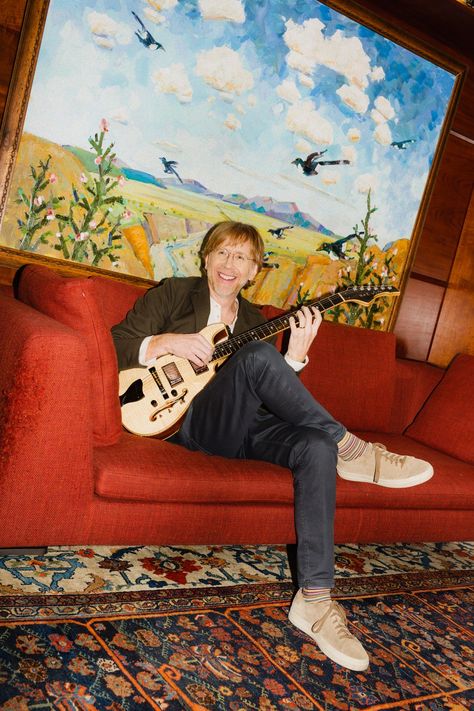 Trey Anastasio sitting on a couch playing the guitar Sitting On A Couch, Ben Harper, Trey Anastasio, Joe Walsh, Jason Isbell, Julien Baker, Playing The Guitar, Steven Tyler, Creative Inspiration