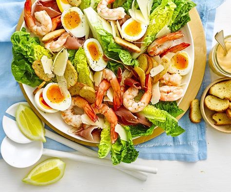 If you like Caesar salad and prawn cocktails, you'll appreciate this salad of prawns, egg, prosciutto and crispy bagel croutons - just drizzle the salad with cocktail sauce! Bagel Croutons, Prawn Cocktails, Peach Food, Prosciutto Salad, Cauliflower Dip, Leek Pie, Prawn Salad, Braised Lamb Shanks, Mushroom Pie