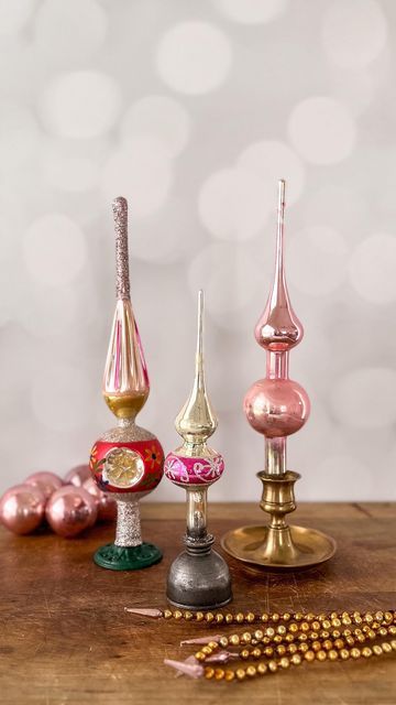 Mindy on Instagram: "🌲 Vintage glass tree toppers can be fun to collect but tricky to display! Here are three ways to use vintage items to safely display these beauties. For the candle holder, I recommend a bit of putty to hold the topper in place. Happy decorating! 🌲 . . . #shinybrite #vintageornaments #treetopper #vintageornaments #aluminumtree" Finial Tree Topper Display, Vintage Tree Topper Display, Vintage Ornament Display, Vintage Tree Topper, Vintage Christmas Tree Toppers, Vintage Tree Toppers, Ornament Display, Glass Tree, Vintage Tree