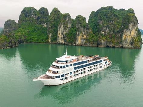 Ambassador Day Cruise is the first and largest luxury day cruise in Halong Bay. The ship is elegantly designed and possesses unique twin sundecks, two luxurious restaurants with a capacity of up to 500 passengers, an open-air Jacuzzi pool with spectacular conveniences and entertainment activities, bringing passengers memorable experiences on the Heritage line. Vietnam Cruise, Jacuzzi Pool, Classic Restaurant, Ha Long Bay, Ha Long, Halong Bay, Luxury Cruise, Luxury Suite, Natural Scenery