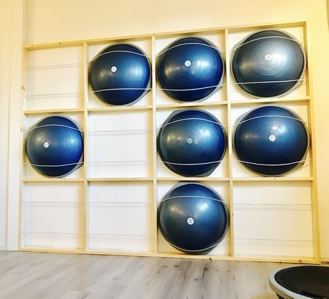 Yoga Ball Storage Diy, Workout Ball Storage, Bosu Ball Storage, Ball Storage Ideas, Exercise Ball Storage, Gym Organization, Gym Organizer, Gym Floor, Pet Decor