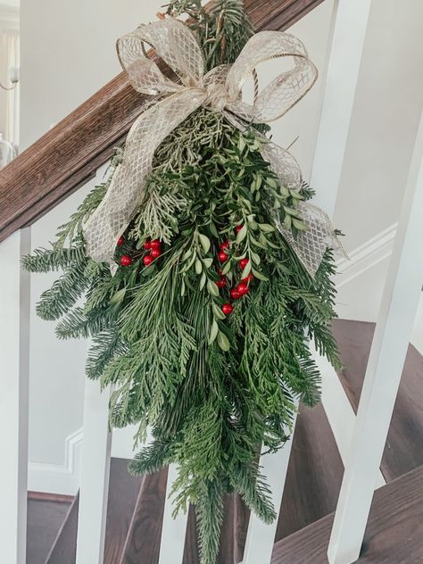 Close Up of Swag on Staircase Christmas Wreaths On Banister, Christmas Swag On Staircase, Wreaths On Staircase, Winter White Decor, Window Swags, Holiday House Tours, Holiday Swag, Teardrop Swag, Christmas Mantle Decor