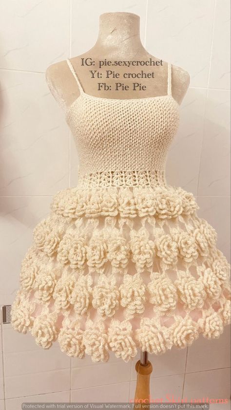 Lacy Summer Skirt: Perfect for warm days and beach outings Prom Crochet Dress, Crotchet Dress Ideas, Crochet Flower Skirt, Crochet Ball Gown, Pencil Skirts Designs, Crochet Prom Dresses, Skirts Patterns, Dresses Patterns, Crochet Dress Boho