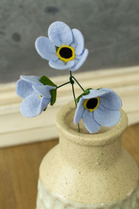 In this tutorial, we'll show you how to make your own Forget Me Not Felt Flowers. These flowers are simple to make, and they look beautiful in any setting! If you're looking for a beautiful way to decorate your home or give a special gift, then check out this tutorial! We'll show you how to make Forget Me Not Felt Flowers in just a few easy steps! Needle Felting Projects, Diy Felt, Forget Me Nots, Felt Flower, Look Beautiful, Needle Felt, Felt Diy, Forget Me Not, Felting Projects