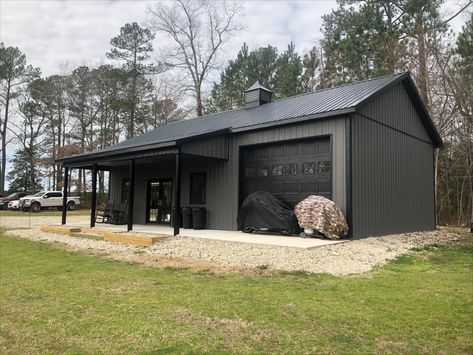 This building is as pretty as they come. The dimensions are 26’x44’x12’, and features include a 6/12 pitch roof, an 8’x28’ lean-to, and a 36” cupola. The colors are Charcoal and Black. Shop With Office Plans, Garage With Boat Storage, Green Metal Building, Construction Planning, Pole Building Garage, Garage Setup, Steel Garage Buildings, Pole Barn Shop, Hunting Cabins