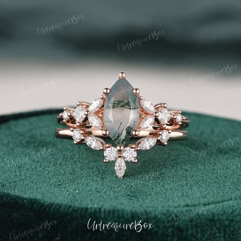 Vintage Green Moss Agate Engagement Ring Sets Marquise Cut Rose Gold Bridal Sets Crystal Ring Princess Cut Moissnaite Ring Women Wedding Set * Order Service: Engraving/Rush Order/ Shipping Upgrade/ Size Upgrade/ 18K or Platinum upgrade https://www.etsy.com/listing/889751602/ Jewelry Details:  * Center Stone: Green Moss Agate, Marquise cut  * Measures: 6x12mm  * Accents Stones: Colorless Moissanite or Natural Diamonds  * about 0.5carats * Natural Diamond: * Color & Clarity: H, SI * Metal Type:  S Vintage Moss Agate Engagement Ring, Vintage Moss Agate Wedding Ring, Green Moss Agate Engagement Ring, Moss Agate Engagement Ring Gold, Miss Agate Engagement Ring Gold, Princess Moss Agate Engagement Ring, Miss Agate Engagement Ring Set, Green Stone Engagement Ring, Gold Bridal Sets