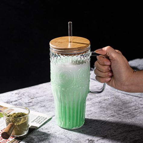 PRICES MAY VARY. Unique vintage sunflower design adds aesthetic appeal to your beverages. Large 32oz capacity accommodates various drinks such as juice and milkshakes. Made from high-quality glass material with excellent transparency for easy cleaning and maintenance. Includes reusable bamboo lids and straws to ensure freshness and portability of your drinks. Features a comfortable handle design for enjoying your beverages anywhere, anytime. Introducing the Bandesun Tumbler Glass Cups with Handl Cute Cups Tumblers, Ads Inspiration, Milk Glasses, Christmas Gift Inspiration, Beverage Bar, Coworker Gifts, Vintage Sunflower, Tumbler Glass, Helpful Things