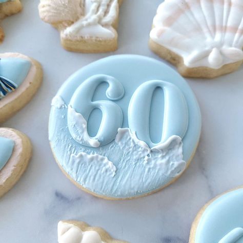 Celebrating Sixty by the Sea! I had so much fun creating this set for an amazing lady who deserves nothing but sunshine, sand, and sea breezes. I truly hope you loved your surprise gift @sarahboutin21 and were able to hit the beach and relax. Happy birthday! ❤️ . . . #beachthemecookies #eddieprinter #beachbag #bathingsuits #seashells #decoratedsugarcookies #nhbakery #nhbaker #beachcookies #birthdaysugarcookies #60thbirthday #southernnh #southernnhsmallbusiness Beach Cookies Royal Icing, Beach Birthday Cookies, Beach Sugar Cookies, Birthday Sugar Cookies Decorated, Beach Themed Cookies, Birthday Decorated Cookies, Seashell Cookies, Number Cookies, Moms 60th