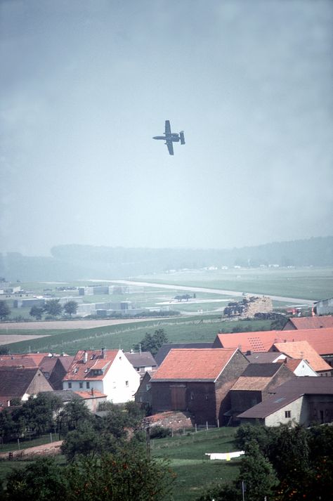 A-10 Thunderbolt flying over a village in West Germany, during REFORGER 1982 A 10 Warthog, Military Aesthetic, Romania Travel, Military Wallpaper, Army Day, Paris Wallpaper, Aviation Photography, Military Heroes, Aircraft Design