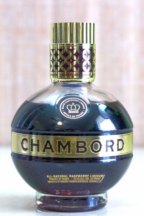 Bottle of Chambord on table top Raspberry Liqueur Cocktails, Chambord Drinks, Chambord Recipes, Chambord Cocktails, Cocktail Pairing, Chambord Liqueur, Liqueur Cocktails, French Cognac, Raspberry Cocktail