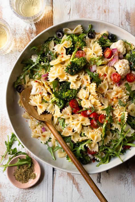 The BEST pasta salad recipe that I make on repeat all summer long. It’s always a huge hit and is super easy to make! Made with juicy tomatoes, fresh broccoli and cauliflower, arugula, black olives, and red onion, this pasta salad is packed full of veggies and tossed in Italian and Ranch dressing! Best Pasta Salad Recipe, Lemon Pepper Pasta, Arugula Pasta, Broccoli And Cauliflower, Ranch Pasta Salad, Ranch Pasta, Best Pasta, Easy Pasta Salad Recipe, Best Pasta Salad