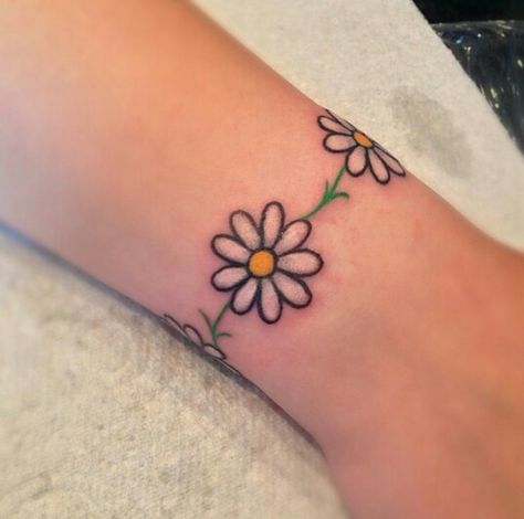 Daisy chain tattoo Daisy Chain Tattoo Ankle, White Daisy Tattoo, Hello Tattoo, Daisy Chain Tattoo, Small Daisy Tattoo, Daisy Tattoos, Lilly Tattoo, Daisy Tattoo Designs, Daisy Flower Tattoos