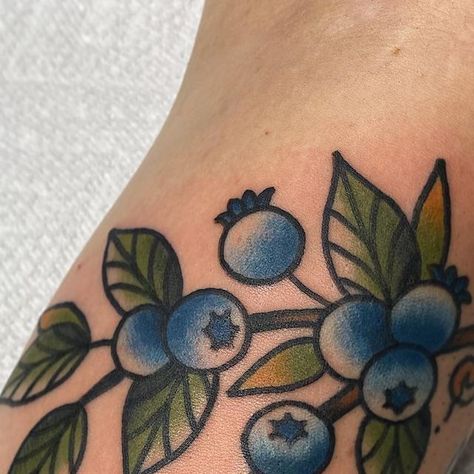 American Traditional Blueberry Tattoo, Blue American Traditional Tattoo, American Traditional Caterpillar Tattoo, American Traditional Berry Tattoo, Old School Wrist Tattoo, Blueberry Tattoo Traditional, Fun American Traditional Tattoos, Blueberry Bush Tattoo, Blueberry Vine Tattoo