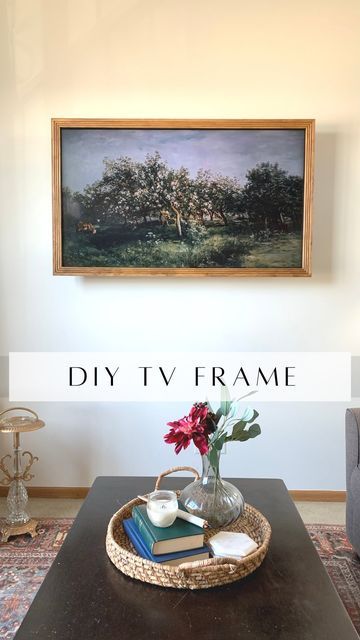 Stephanie | Design + DIY on a Budget on Instagram: "You don’t need a frame tv to have a “frame tv”😉 If you have a flat tv mount, this looks even better! We have this tv on a swivel, so it isn’t completely flat to the wall, but I think it looks pretty good considering! Would you try this? Drop your questions below!⬇️ #diytvframe #diyhome #diy #moneysavinghacks #diylookforless #diyonabudget #diyideas" Mounted Frame Tv, Diy Tv Frame Ideas Flat Screen Tvs, Diy Tv Frame, Frame Tv Gallery Wall, Tv Gallery Wall, Tv Mounted, Swivel Tv, Flat Tv, Family Cabin